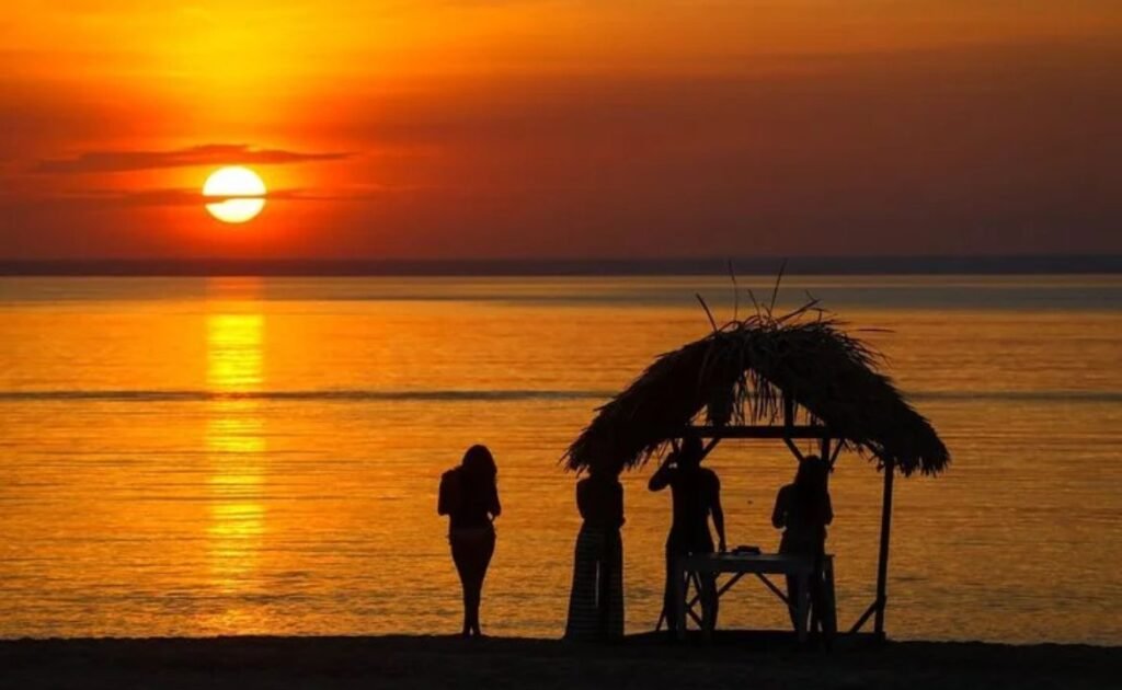 Watch sunset at Ponta do Cururu
